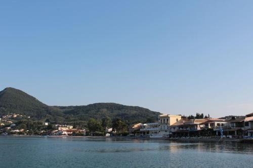 a view of a body of water with houses at Evita's ikia seaside luxury house in Mesongi