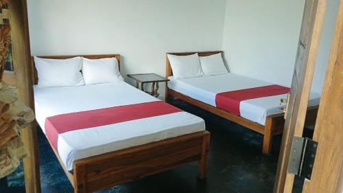 Un pat sau paturi într-o cameră la Eco Green villa