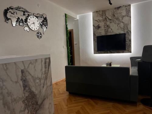 Μια τηλεόραση ή/και κέντρο ψυχαγωγίας στο GAMA Apartments
