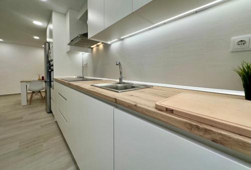 a kitchen with a sink and a counter at El Mirador De Casablanca in Alcantarilla