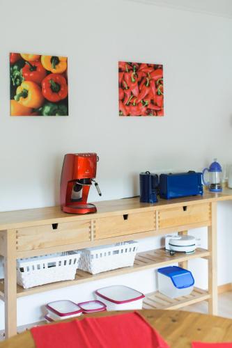 a wooden table with a coffee maker on top of it at Ferienwohnung Spiegelberg in Spiegelberg