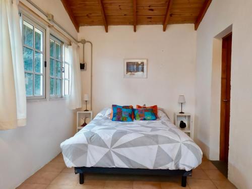 A bed or beds in a room at Cabaña Los Radales