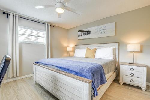 a bedroom with a large bed and a window at Private and Picturesque Escape on Lake Henry! in Lake Placid