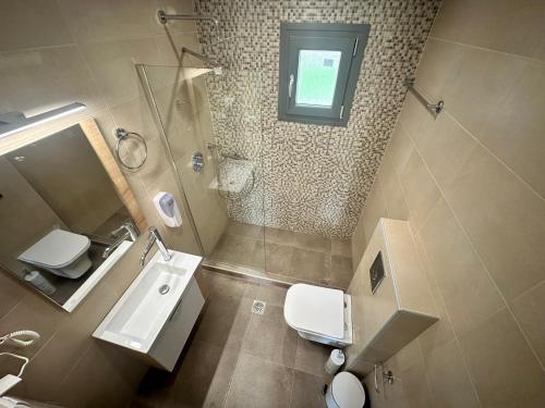 Ένα μπάνιο στο Ktimavita Apartment 1