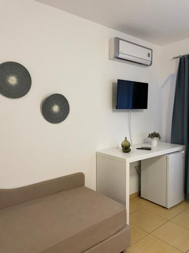 TV a/nebo společenská místnost v ubytování B&B Dalla Nonna