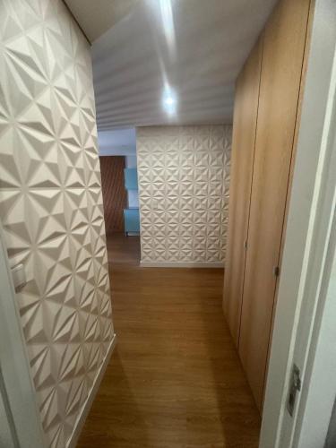 a hallway with a room with a wall at Francisco Barbosa in Estarreja