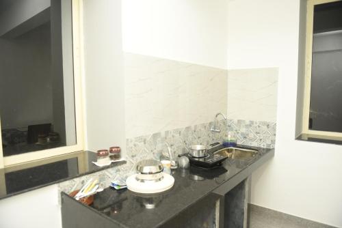 Kuchyň nebo kuchyňský kout v ubytování Sai Homestay Panaji Studio