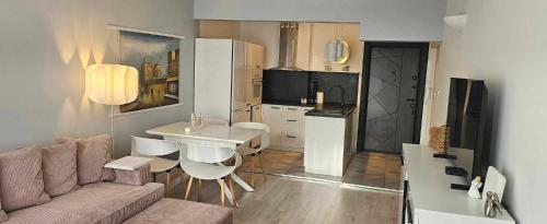 TV/trung tâm giải trí tại Апартамент ЛазуР