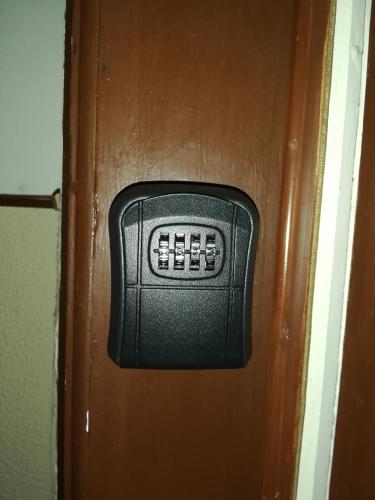 a door with a speaker on the door at Casa Vacanze Mariposa in Trieste
