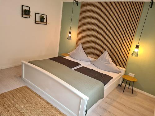 a bedroom with a bed in a room with a window at FeWo Alt Beilstein in Beilstein
