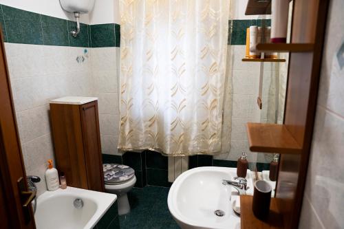 Koupelna v ubytování Appartamento Nettuno