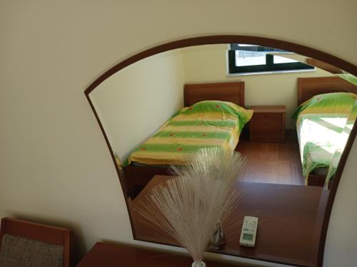 Postel nebo postele na pokoji v ubytování Apartman Olja