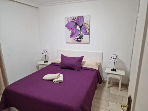 Ένα ή περισσότερα κρεβάτια σε δωμάτιο στο Vila Lavanda