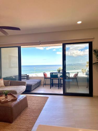 a living room with a view of the ocean at Luxury, Ocean View, Pool, Jacuzzi, Valle de Guadalupe, Los Portales De Garcia, Splash, Encanto Restaurants, Surf Breaks in Primo Tapia, Rosarito in Rosarito
