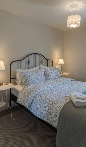 Cama o camas de una habitación en Le toit bleu