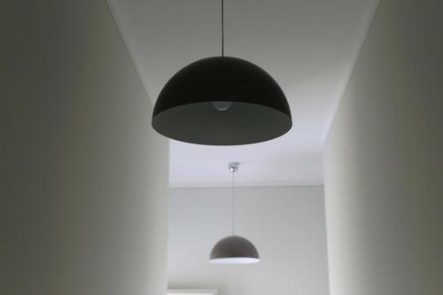 two lights hanging from the ceiling in a room at Villa delle Rose in Portogruaro