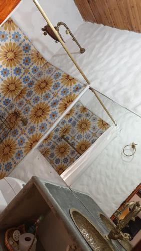 an umbrella is on top of a bed at Buriti EcoH RNT56521, via Termales Santa Rosa de Cabal in Santa Rosa de Cabal