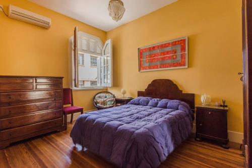 En eller flere senge i et værelse på Sky Garden Sarandi [ Decó ] Pool & Barbacue