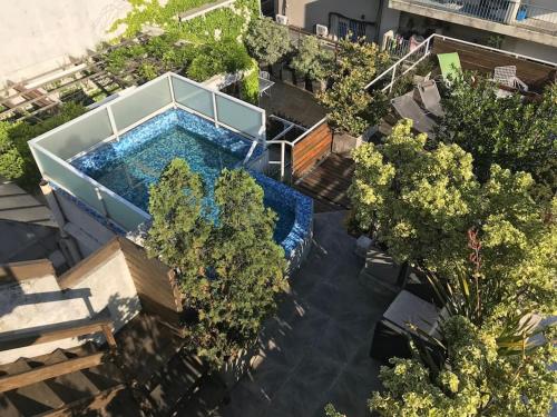 נוף של הבריכה ב-Sky Garden Sarandi [ SuperLoft ] Pool & Barbacue או בסביבה