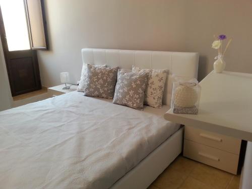 Ένα ή περισσότερα κρεβάτια σε δωμάτιο στο La Bifora