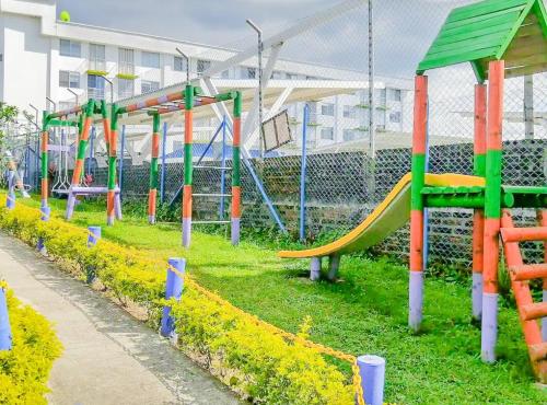 Children's play area sa APARTAMENTO eje cafetero Parque del CAFE