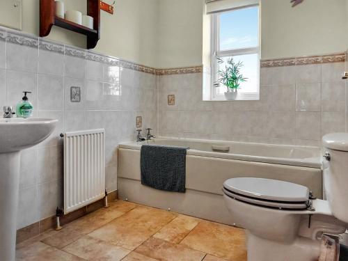 Ett badrum på Brompton Lodge