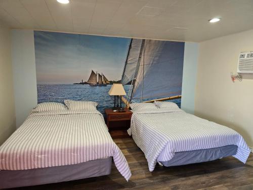 Postel nebo postele na pokoji v ubytování Stardust Motel