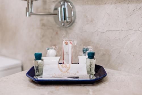 a tray with toiletries on a counter in a bathroom at Quinta Real Oaxaca in Oaxaca City
