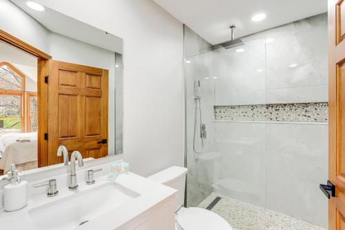 a bathroom with a sink and a shower at Blue Ridge Mountain Condo with Golf Course Views! in Burnsville