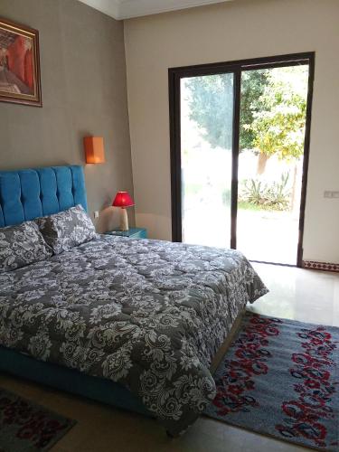 Postel nebo postele na pokoji v ubytování Villa nova Marrakech