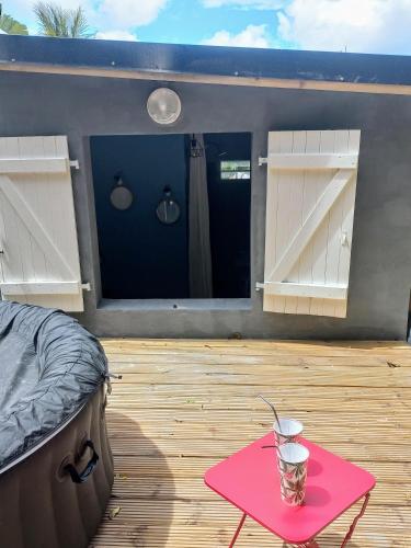 Un balcón o terraza de Tropi Kay' Location - Bungalow avec jacuzzi