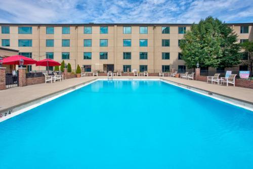 a large swimming pool in front of a building at Crowne Plaza Chicago-Northbrook, an IHG Hotel in Northbrook