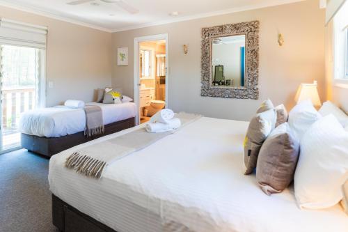 Ένα ή περισσότερα κρεβάτια σε δωμάτιο στο Hunter Moon Country House, Hunter Valley