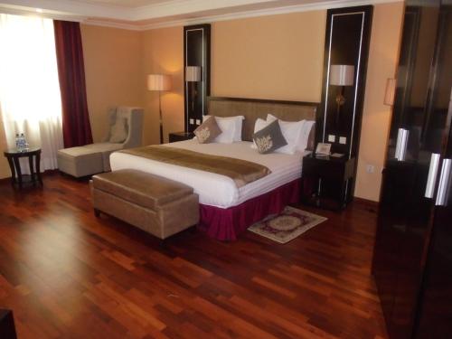 Katil atau katil-katil dalam bilik di Saro Maria Hotel