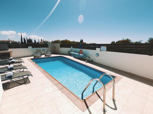 a swimming pool on the roof of a building at Villa Lankas with Heated pool in Ayia Napa