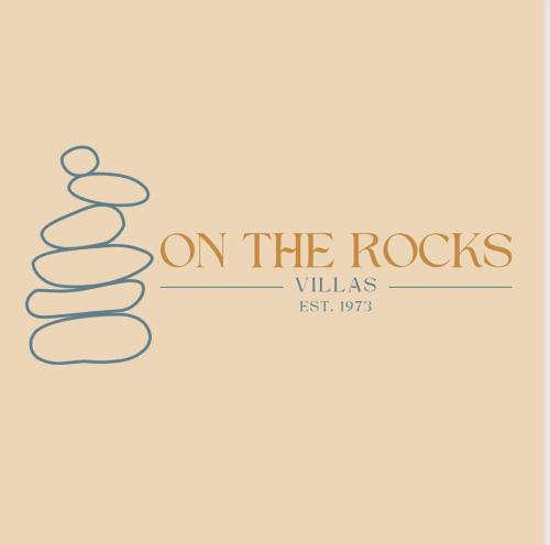 a zodiac sign on the rocks logo at On the Rocks @ Eersterivier in Eersterivierstrand