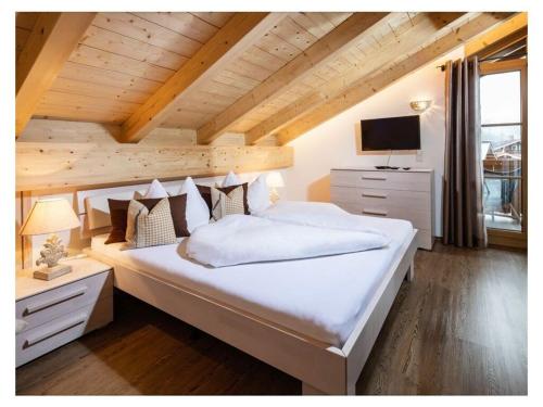 מיטה או מיטות בחדר ב-Königssee - Reich family
