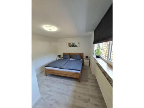 En eller flere senge i et værelse på Holiday apartment Glockenhorn