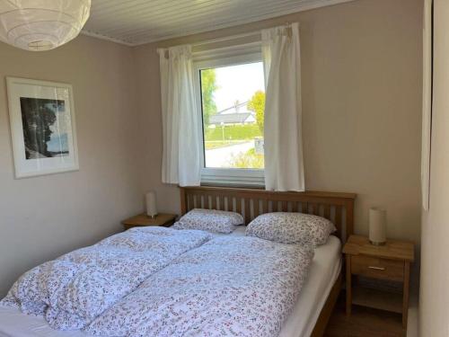 Giường trong phòng chung tại Roca Comfortable holiday residence