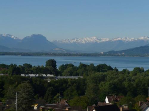 a view of a lake with mountains in the background at Hanssen in Lindau Lake Constance in Lindau