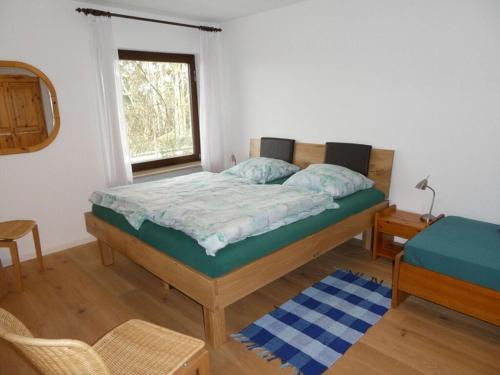 a bedroom with a bed and a window at Hanssen in Lindau Lake Constance in Lindau