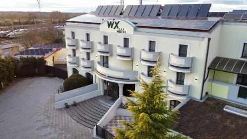 an aerial view of a building with a sign on it at WX Hotel in Bratislava