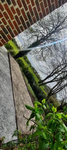 a view from under a roof of a building at La Villa Beausejour in Baives