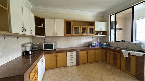 Kuchyň nebo kuchyňský kout v ubytování Singa angsa house 狮鵝坊 半独立式别墅