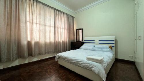 Postel nebo postele na pokoji v ubytování Singa angsa house 狮鵝坊 半独立式别墅