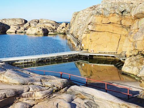 a large pool of water on a rocky cliff at 4 star holiday home in Smögen-By Traum in Smögen