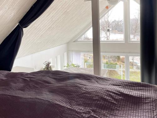 Katil atau katil-katil dalam bilik di 5 star holiday home in Ronneby-By Traum