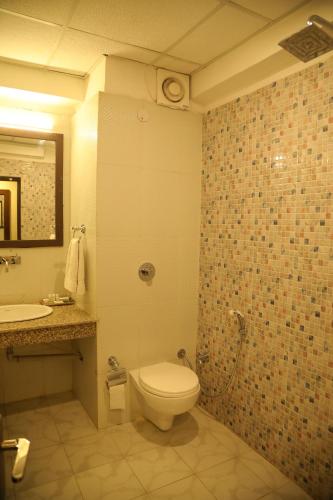 Koupelna v ubytování Hotel Ganga Aatitheyam