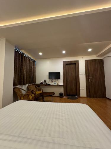 Fratelli Guest Houseにあるテレビまたはエンターテインメントセンター