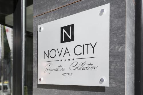 a sign for a nova city symphony collection at Nova City Garni Hotel Signature Collection in Belgrade